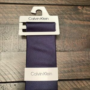 Calvin Klein dark blue tie. NWT.
